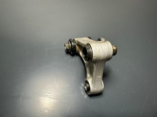 LEVERAGGIO SUPERIORE HONDA NS 125 F 1984 1985 1986 ARM ASSY.,CUSHION 52460KR1760
